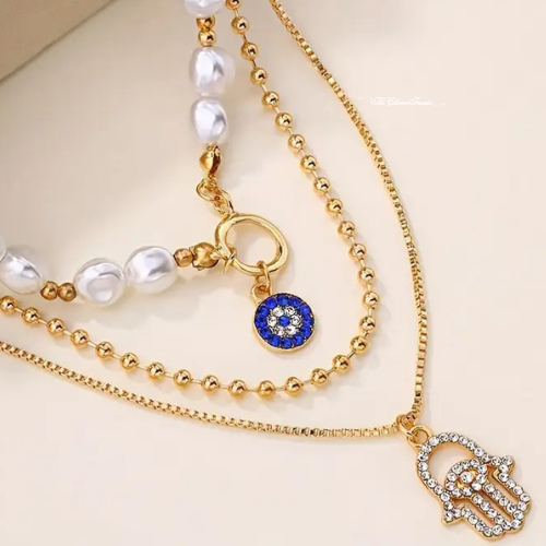 Pearl Necklace with Evil Eye and Hamsa Hand Pendants