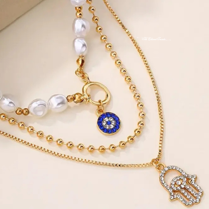 Pearl Necklace with Evil Eye and Hamsa Hand Pendants