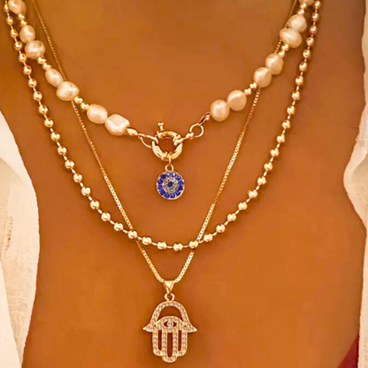 Pearl Necklace with Evil Eye and Hamsa Hand Pendants