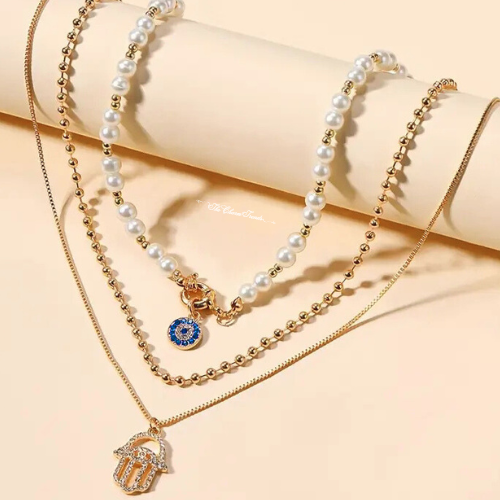 Pearl Necklace with Evil Eye and Hamsa Hand Pendants